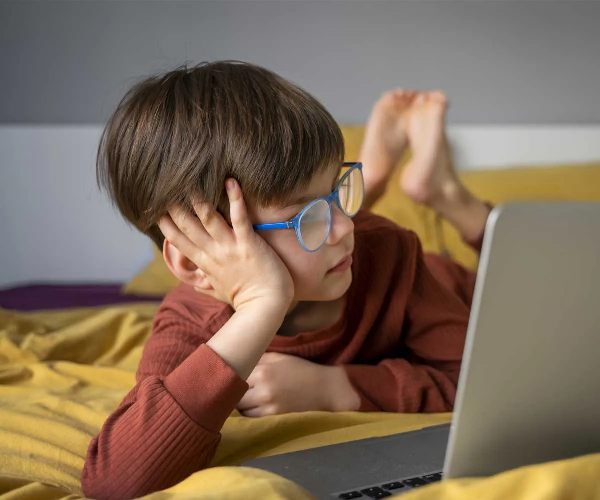 Child moving from screen time to study time